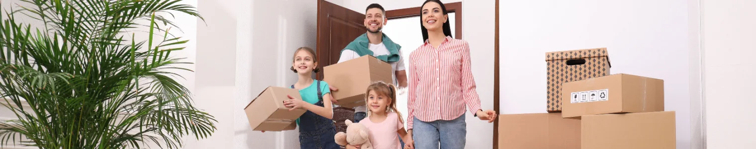 happy family moving into new home