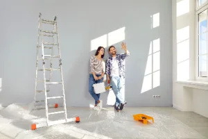 young family couple doing renovations home